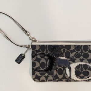 Coach navy blue and silver wristlet